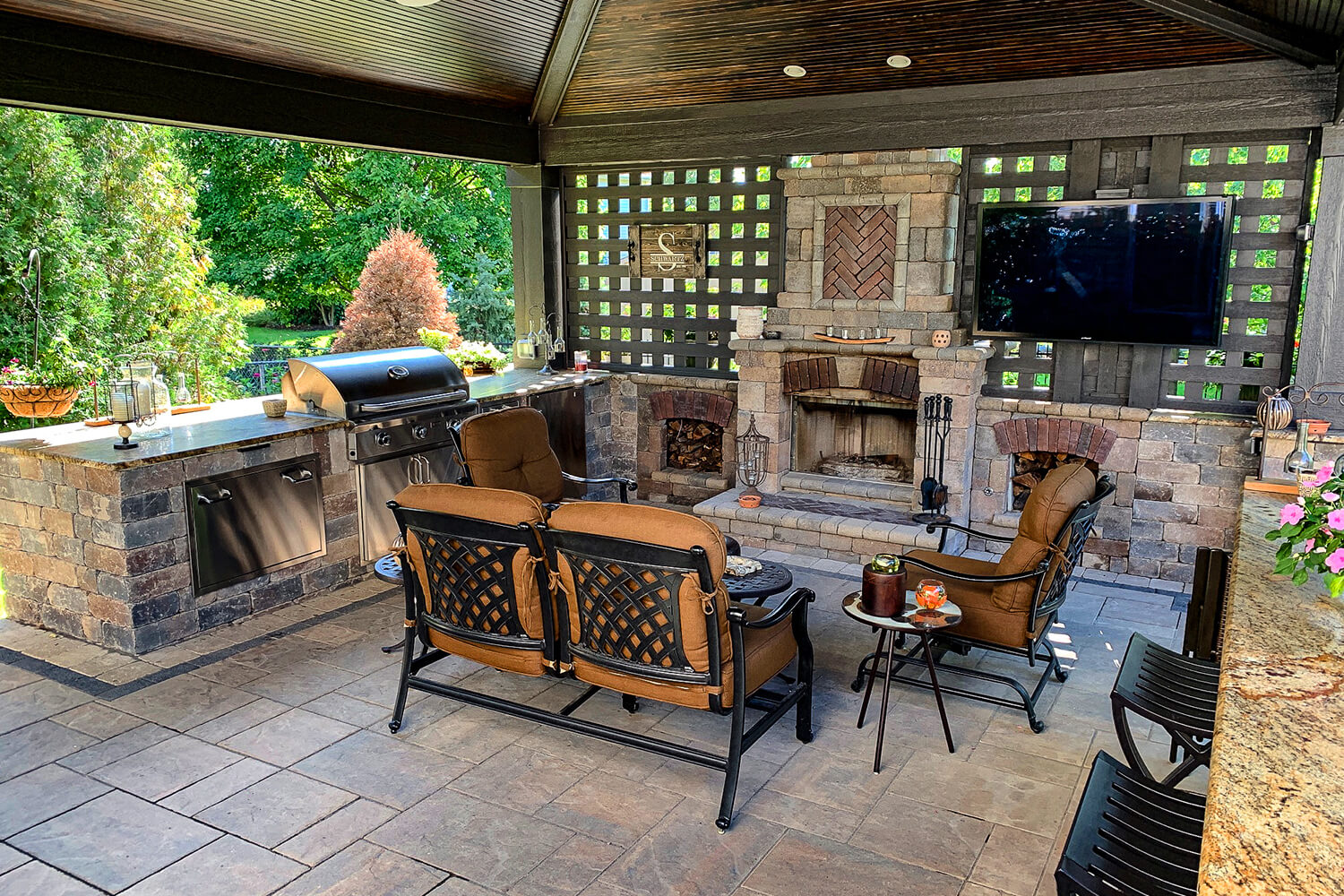 Outdoor Kitchen, Pergola, and Landscape Design by A Touch of Green