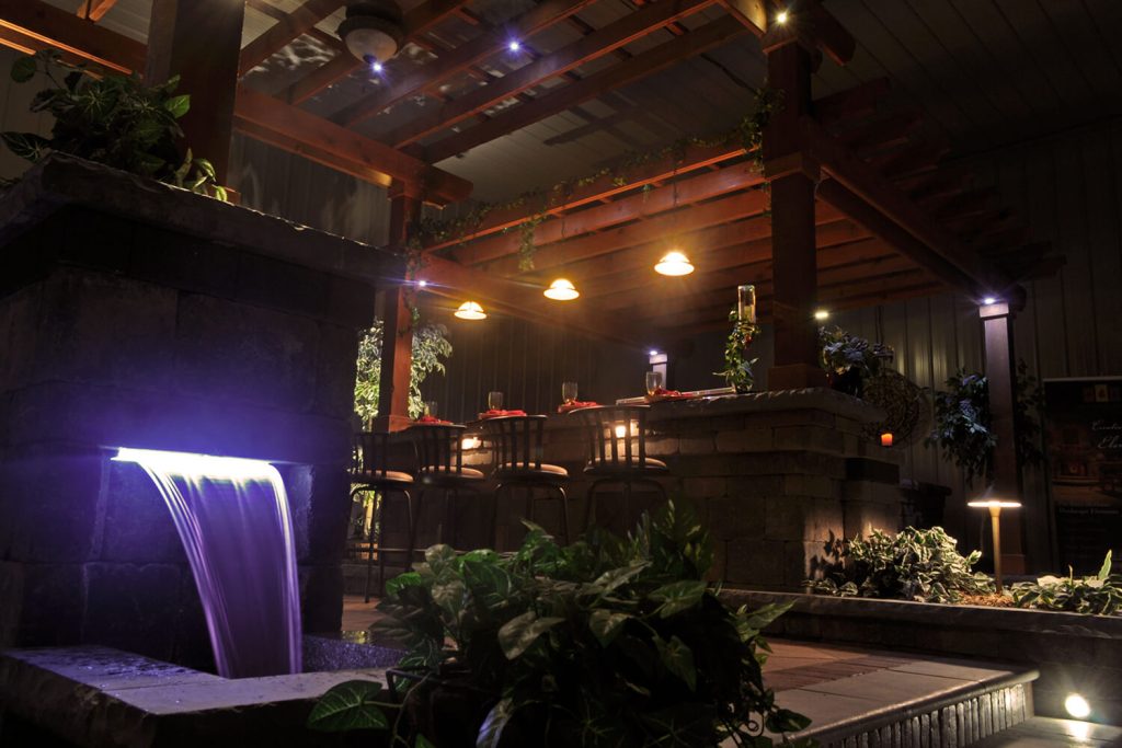 Outdoor Lighting, Water Feature, and Pergola by A Touch of Green