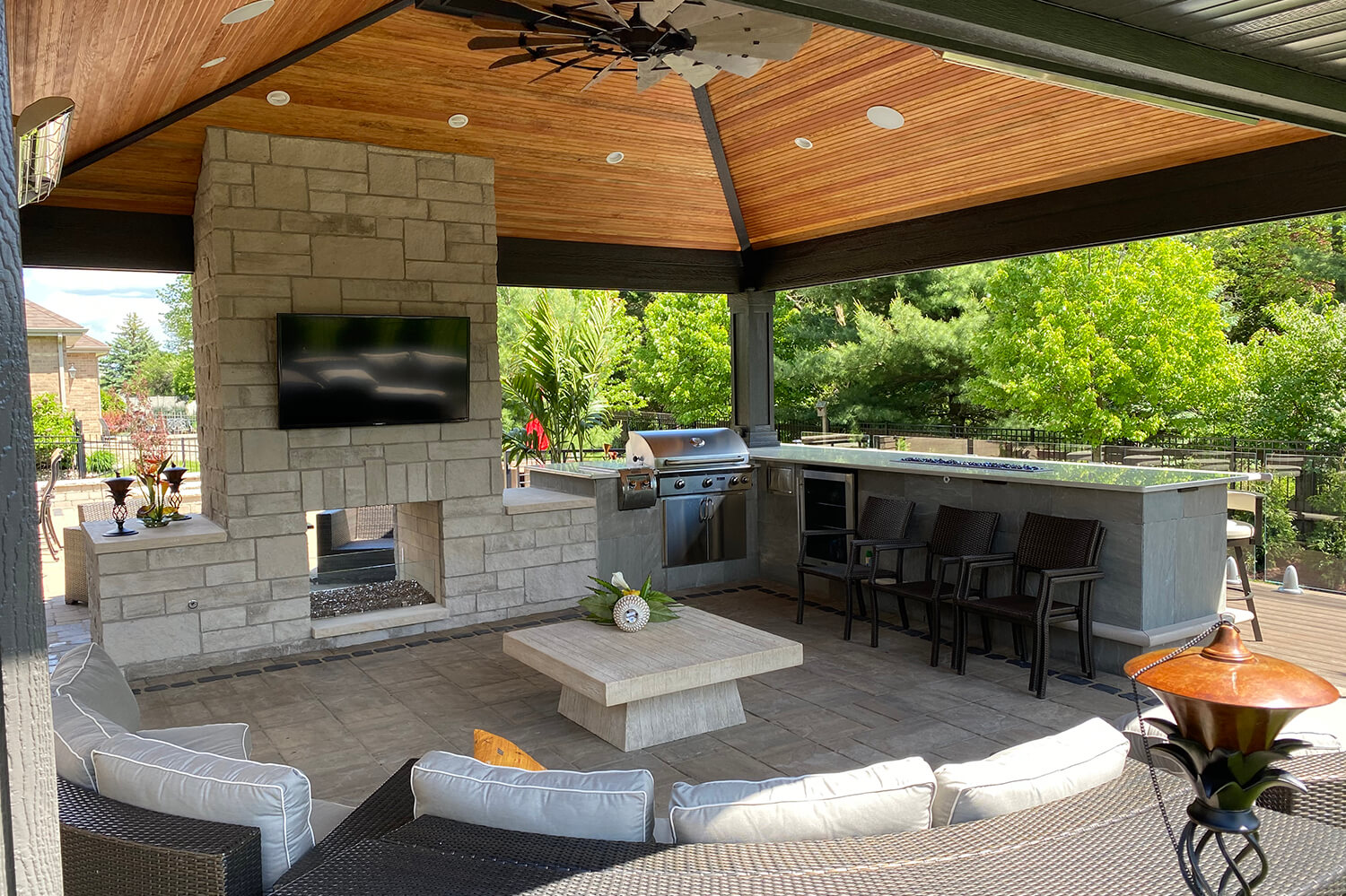 Outdoor Kitchen, Fire Feature, and Pergola by A Touch of Green