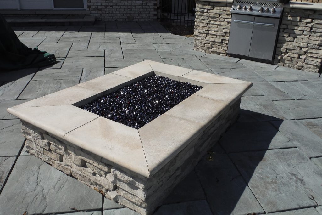 Fire Feature, Outdoor Kitchen, and Landscape Design by A Touch of Green