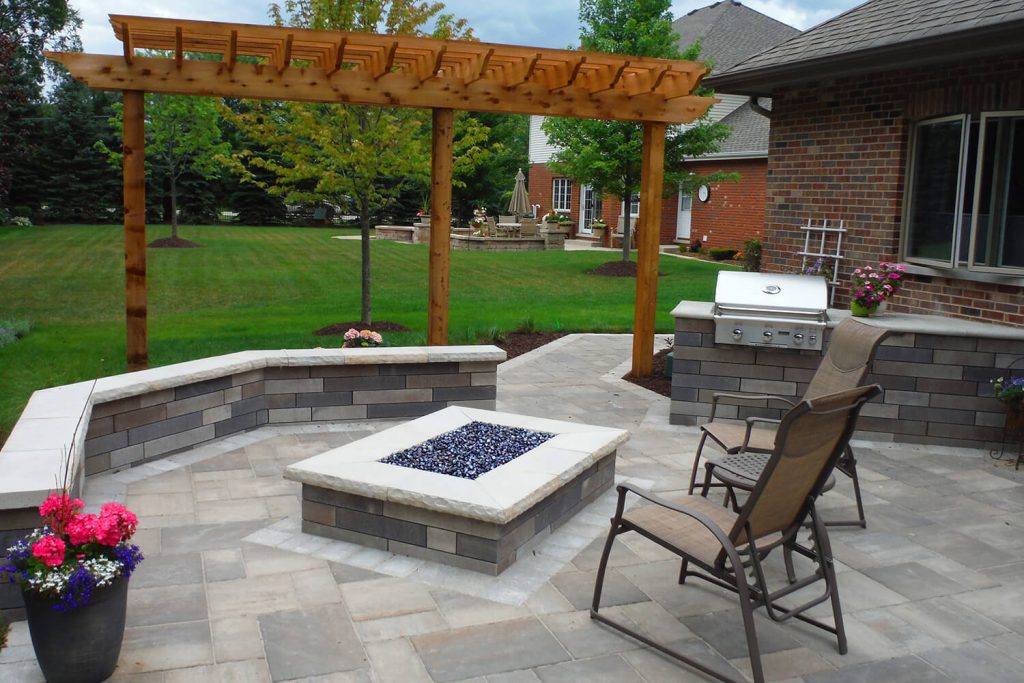 Fire Feature, Pergola, and Landscape Design by A Touch of Green