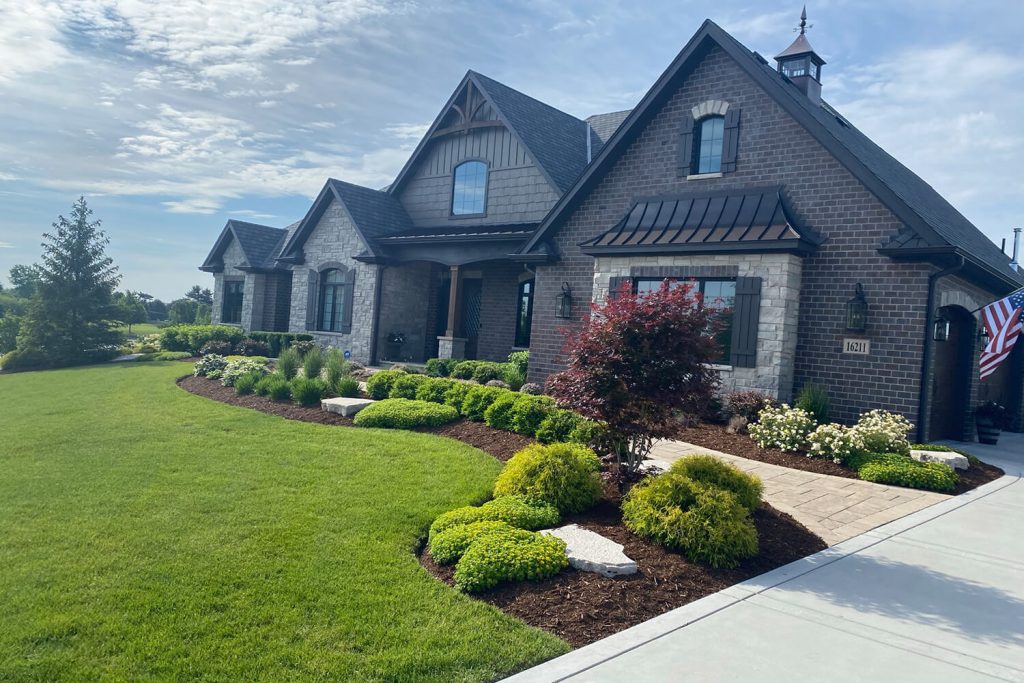Paver Walkway and Landscape Design by A Touch of Green