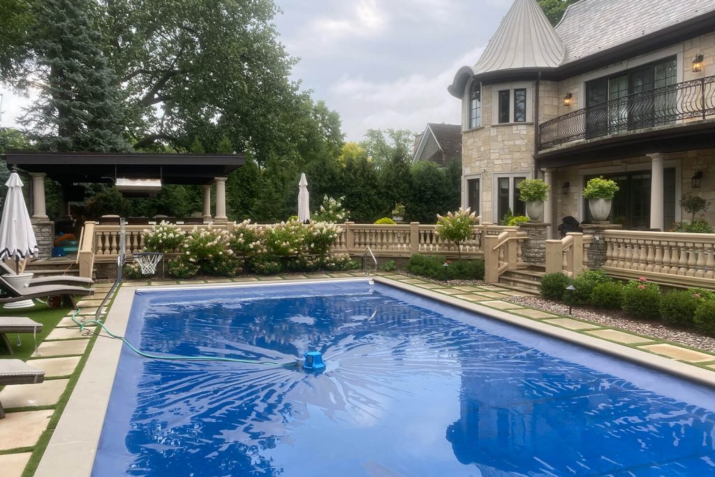 Paver Pool Deck, Pergola, and Landscape Design by A Touch of Green