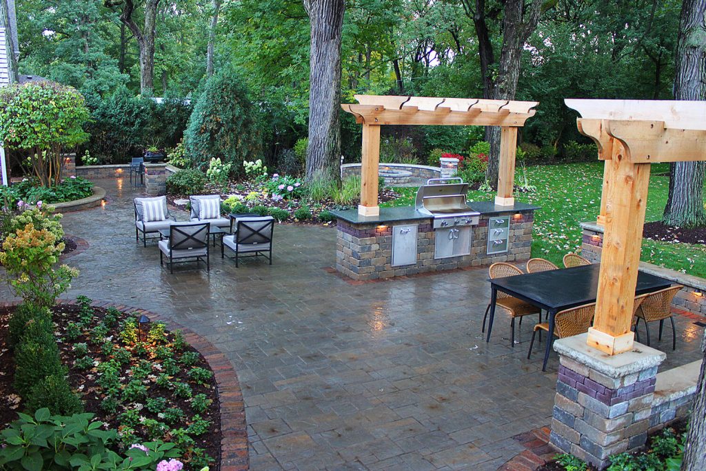 Outdoor Kitchen, Pavers, and Landscape Design by A Touch of Green