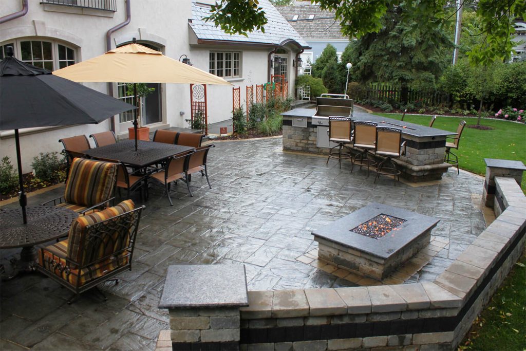 Outdoor Kitchen, Pavers, and Landscape Design by A Touch of Green