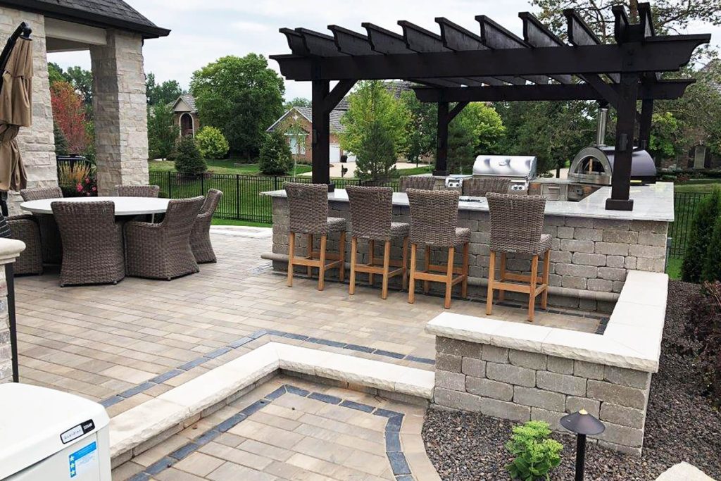 Outdoor Kitchen, Pavers, and Landscape Design by A Touch of Green
