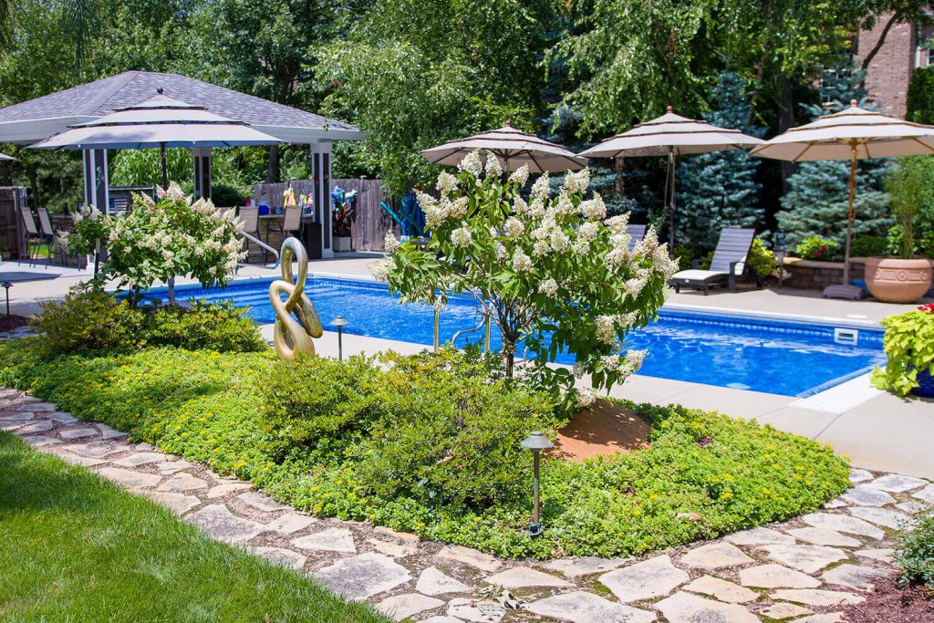 Pavers, Outdoor Lighting, and Landscape Design by A Touch of Green