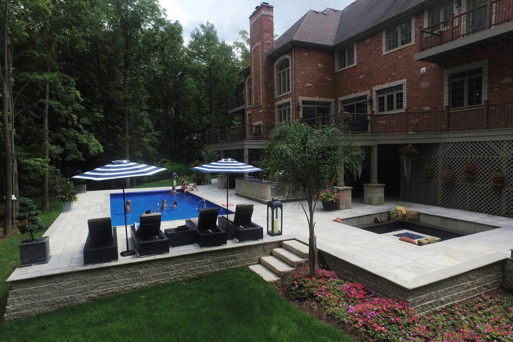 Pool Deck, Pavers, and Landscape Design by A Touch of Green