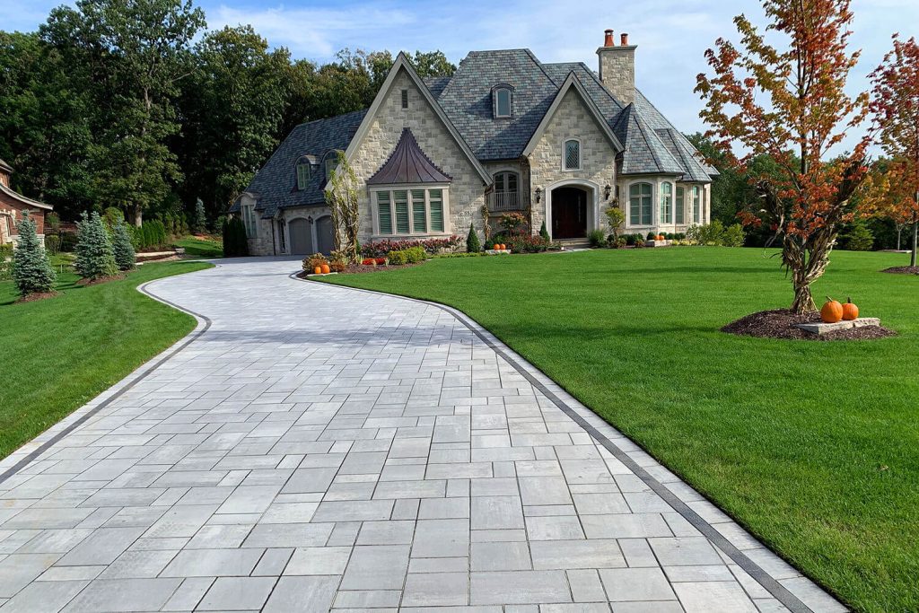 Paver Driveway and Landscape Design by A Touch of Green