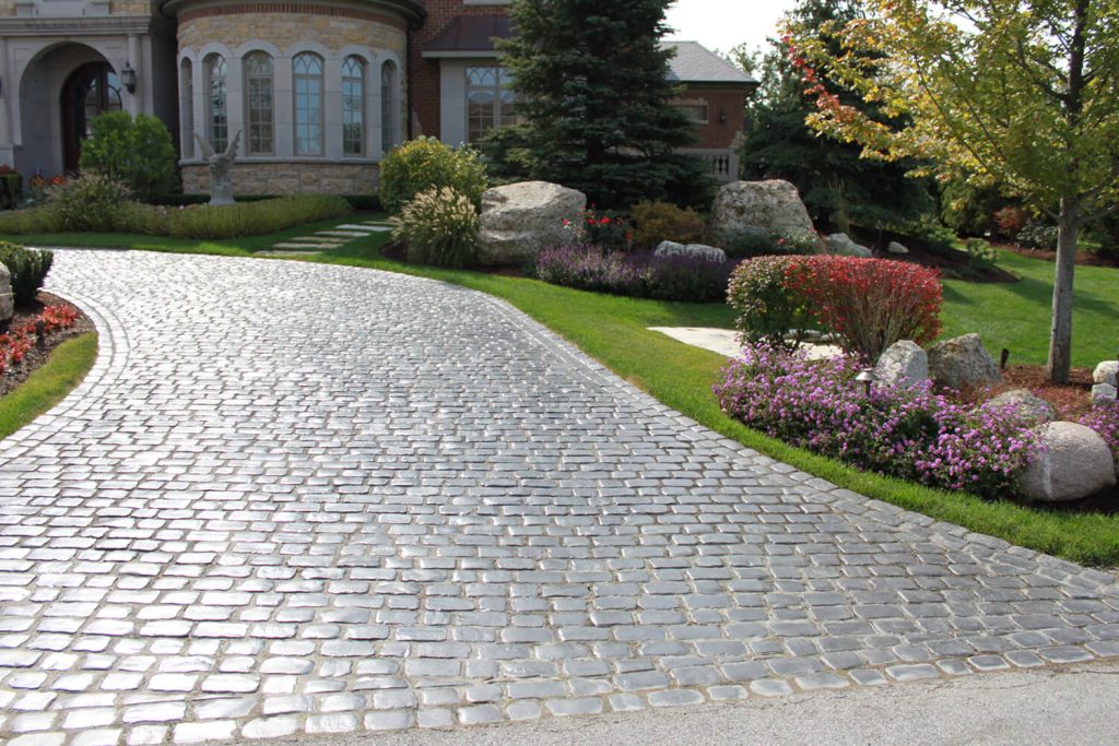 Paver Driveway and Landscape Design by A Touch of Green