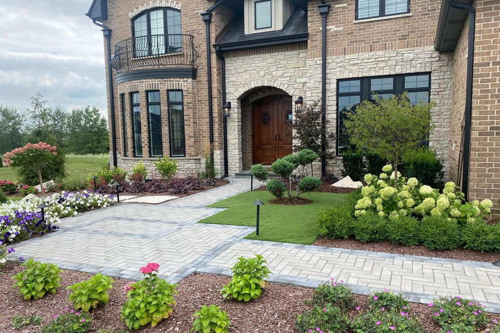 Paver Walkway and Landscape Design by A Touch of Green