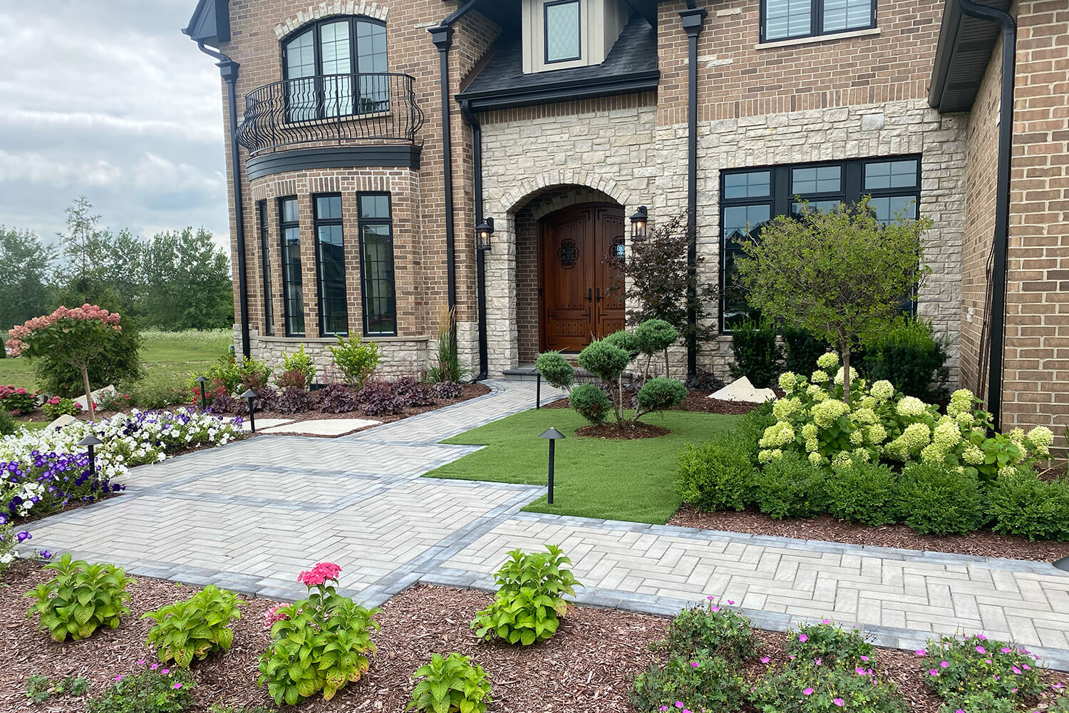 Paver Walkway and Landscape Design by A Touch of Green