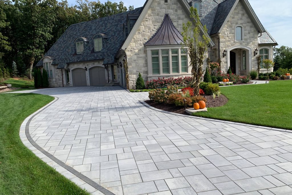 Paver Driveway and Landscape Design by A Touch of Green