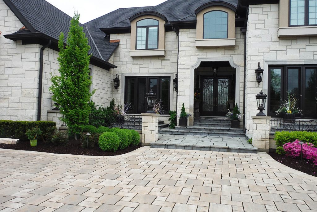 Paver Driveway and Landscape Design by A Touch of Green