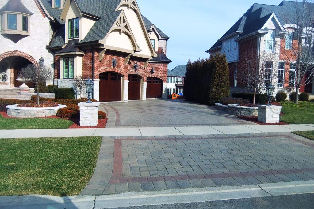 Paver Driveway and Landscape Design by A Touch of Green