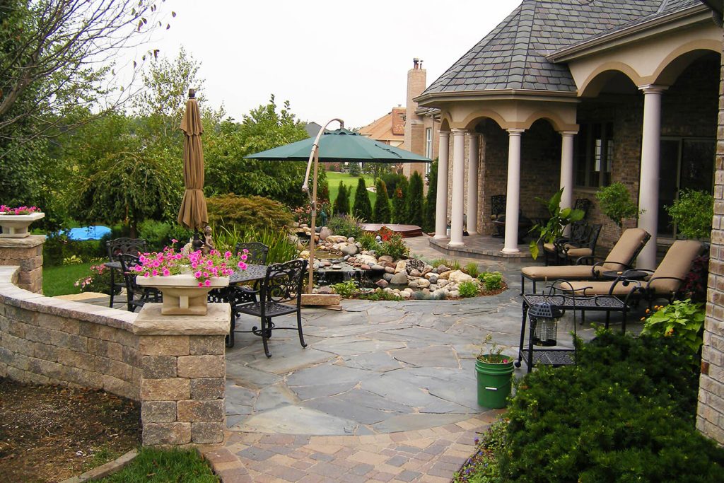 Paver Patio and Landscape Design by A Touch of Green