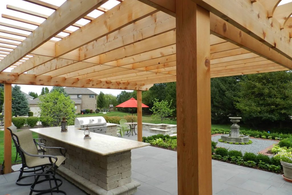 Pergola, Outdoor Kitchen, and Landscape Design by A Touch of Green