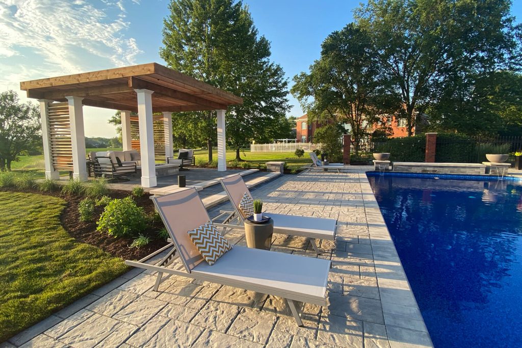 Pergolas, Paver Pool Deck, and Landscape Design by A Touch of Green