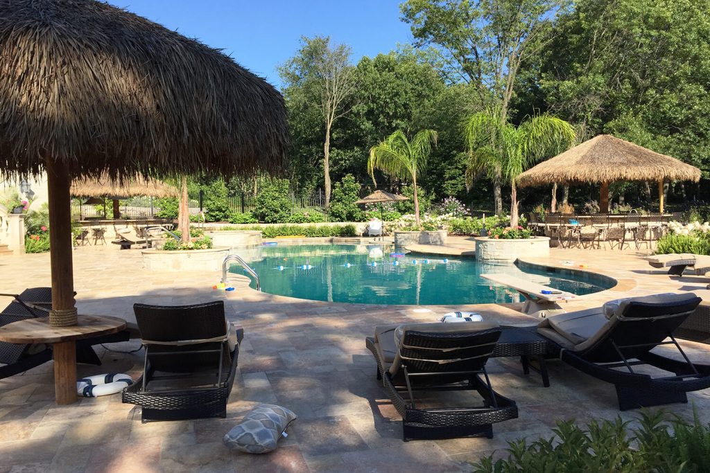 Pergolas, Paver Pool Deck, and Landscape Design by A Touch of Green